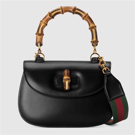 borsa gucci con manici di bamboo|La storia della Gucci Bamboo 1947, un oggetto che è .